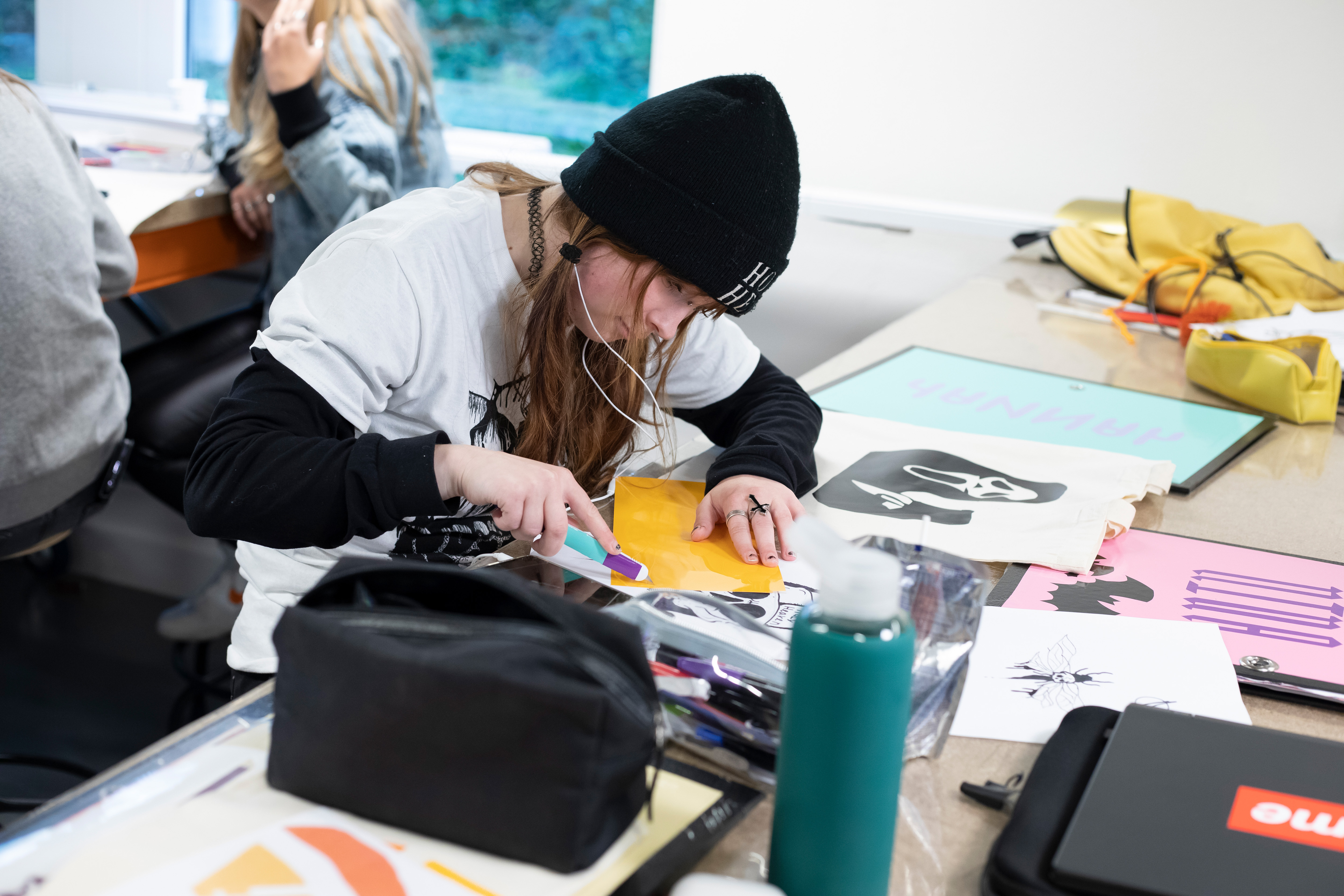 Student maakt een logo