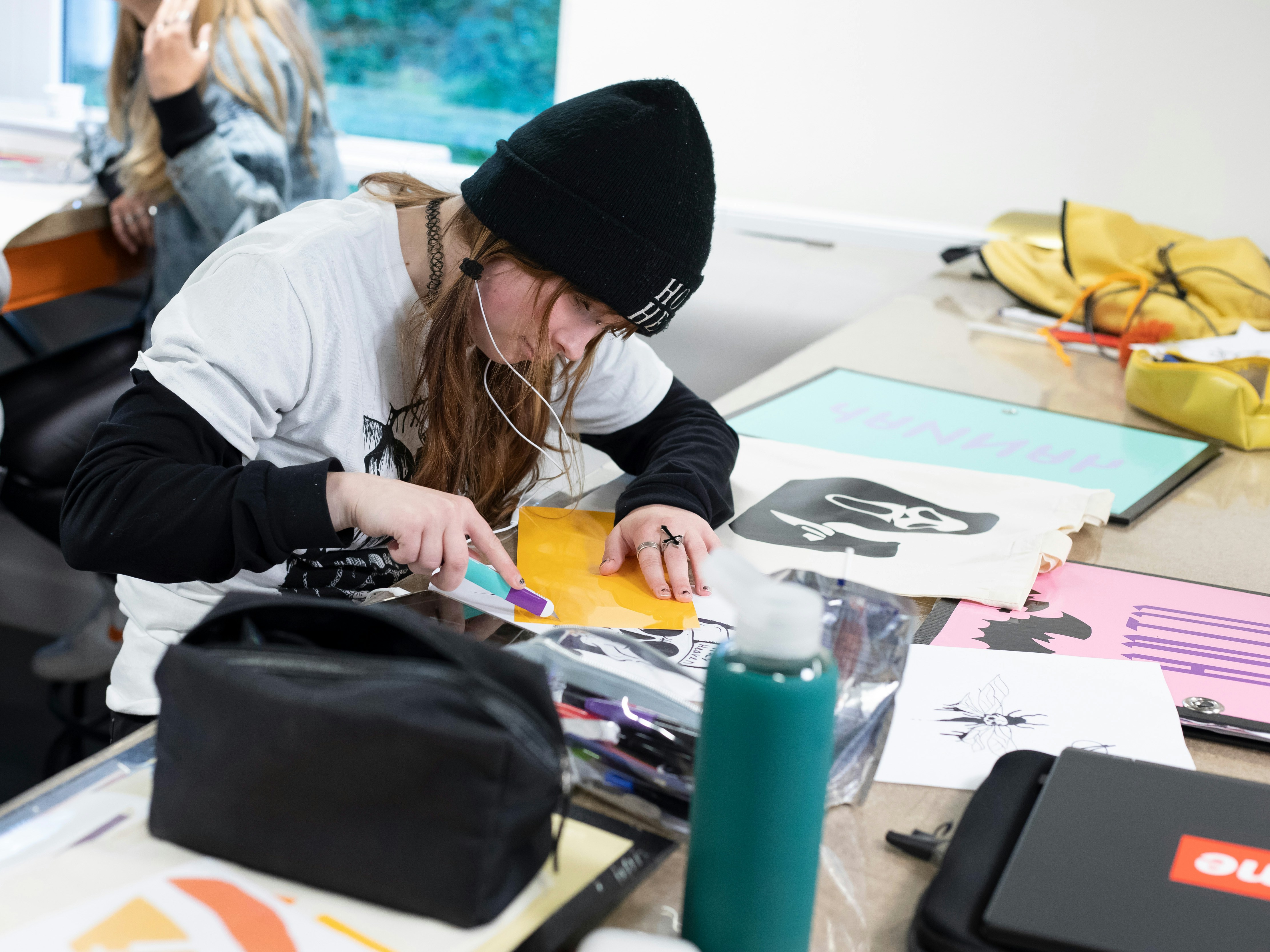 Student maakt een logo