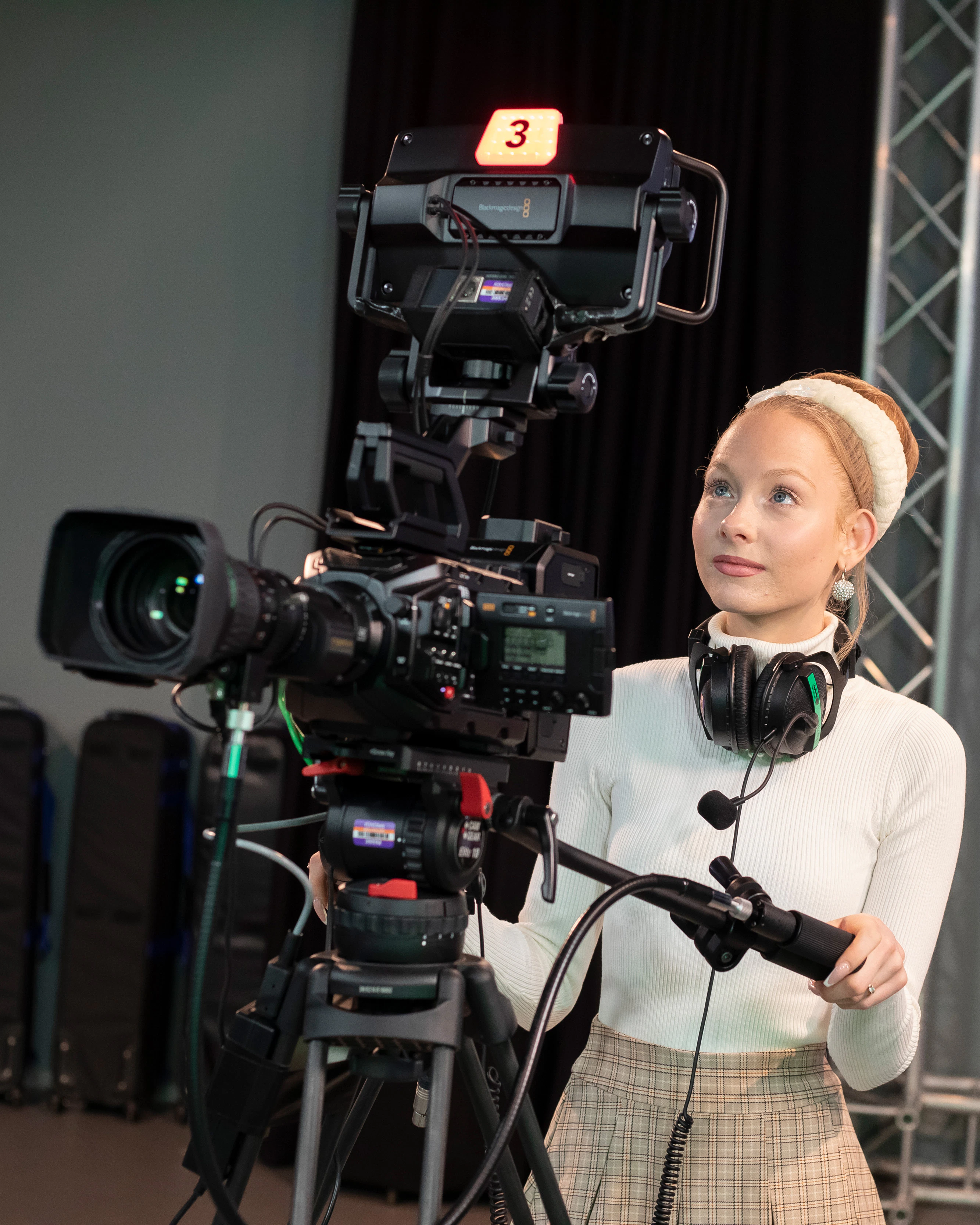 Een student met camera